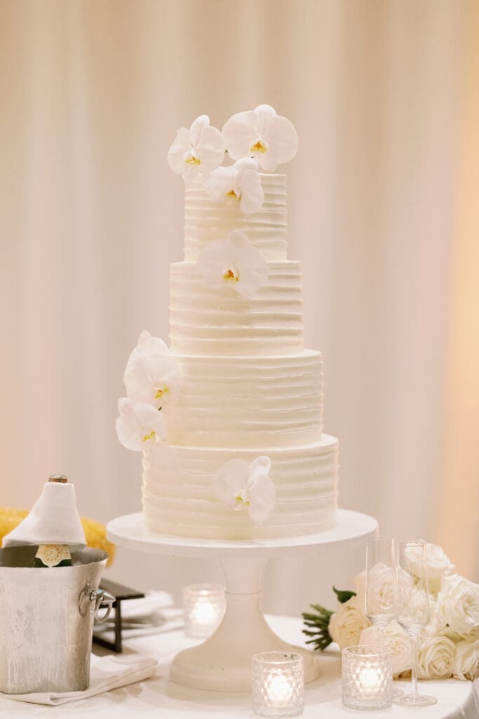 custom white cake for four seasons austin wedding