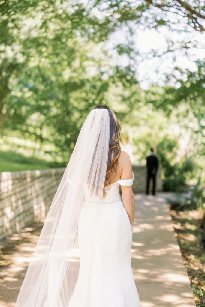 bride seeing groom for first look at four seasons austin wedding