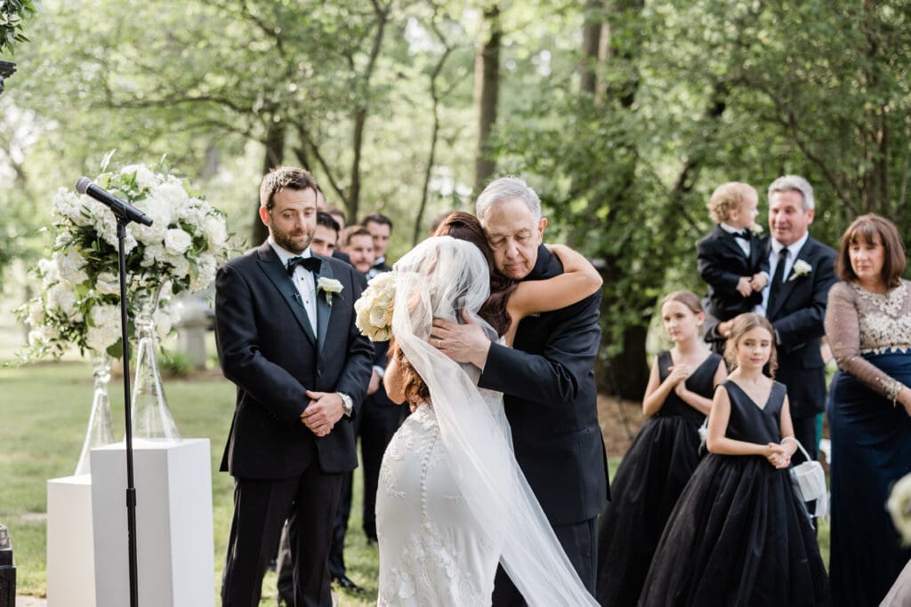 dad gives daughter away at Montebello Estate wedding