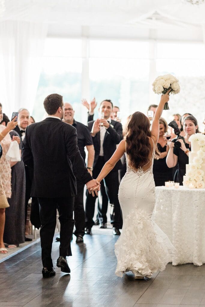 bride and groom entrance into montebello estate reception