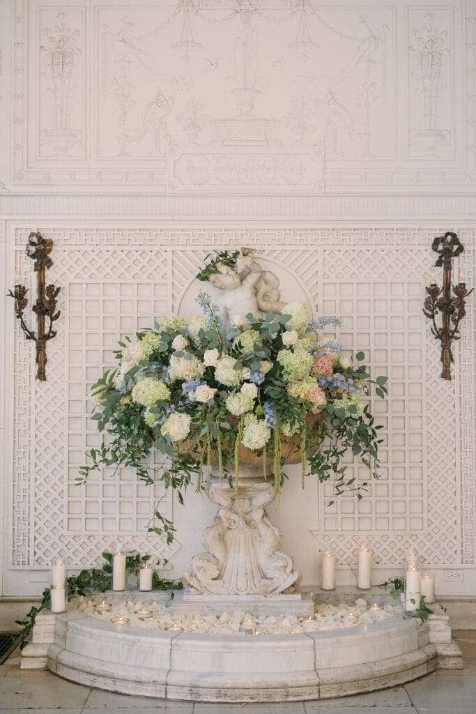 fountain decorated with florals at The armour house lake forest