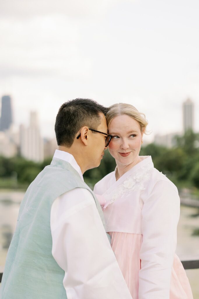 Bride and Groom in Hanboks pose for Lincoln Park Engagement Photos