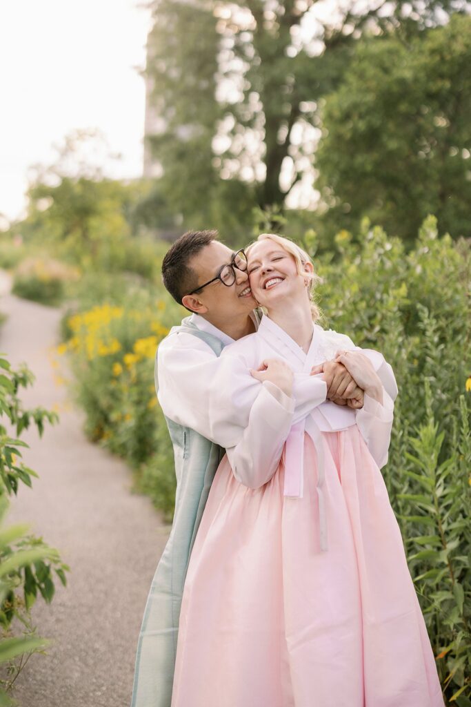 Bride and Groom in Hanboks pose for Lincoln Park Engagement Photos