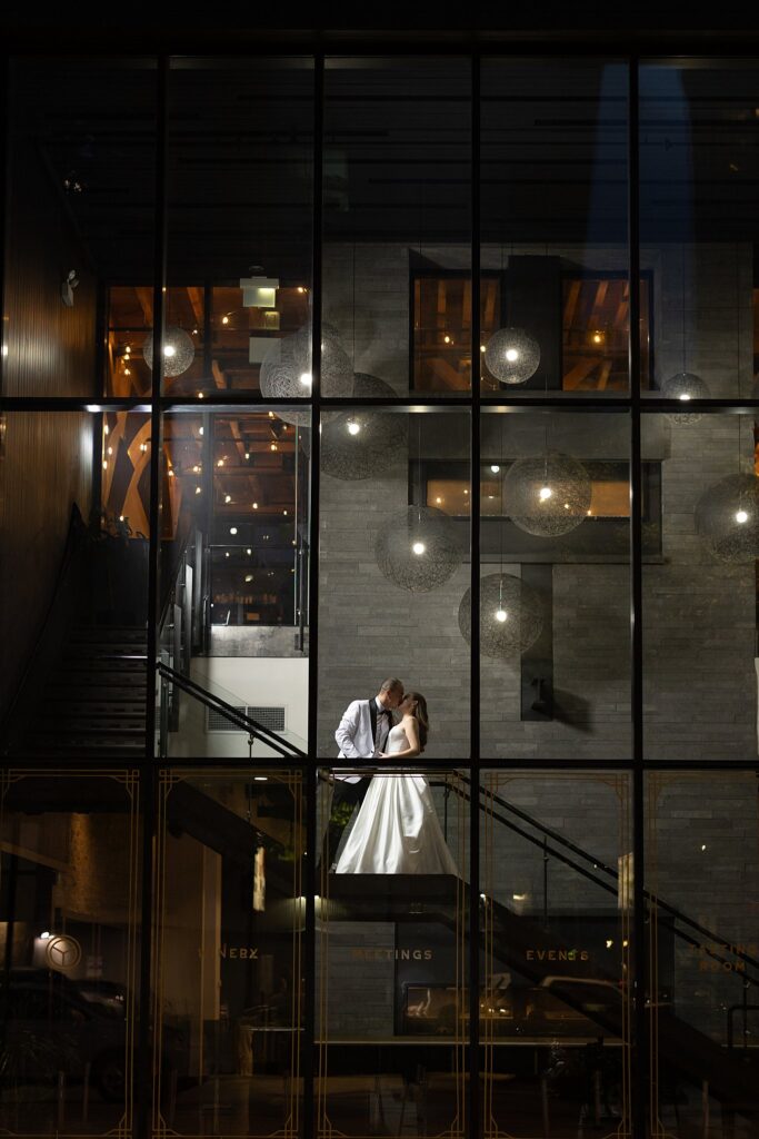 bride and groom on stairs at Chicago Winery Wedding