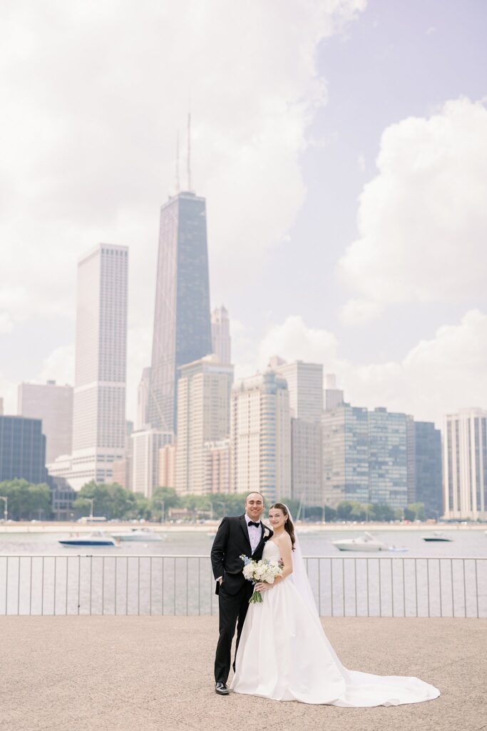 Bride and groom posing at Olive Park before Chicago Winery Wedding