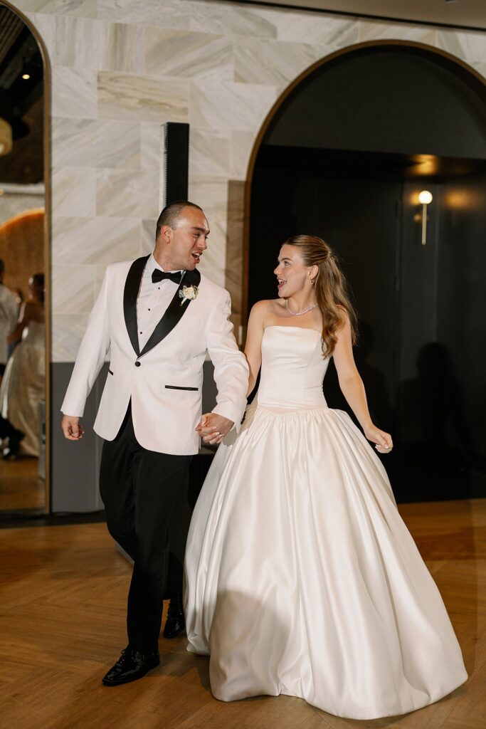 bride and groom entering reception at Chicago Winery Wedding