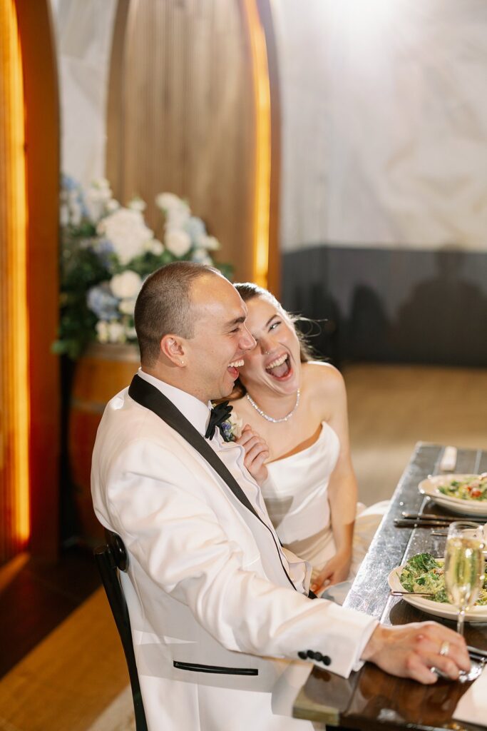 bride and groom hearing toasts at Chicago Winery Wedding
