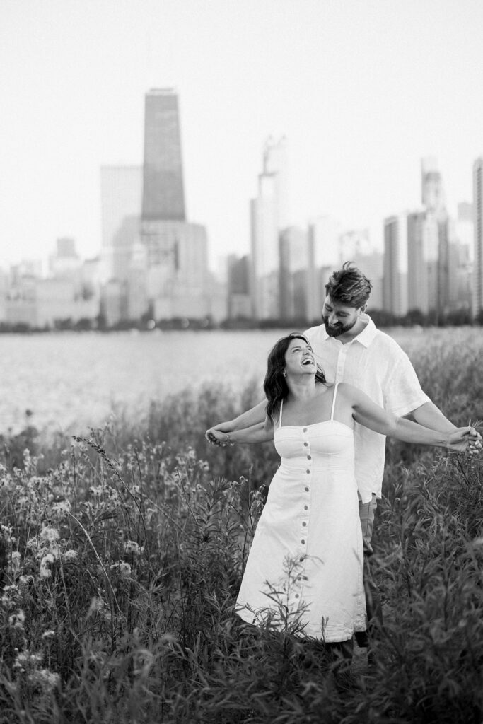 bride and groom posing for north avenue beach engagement photos