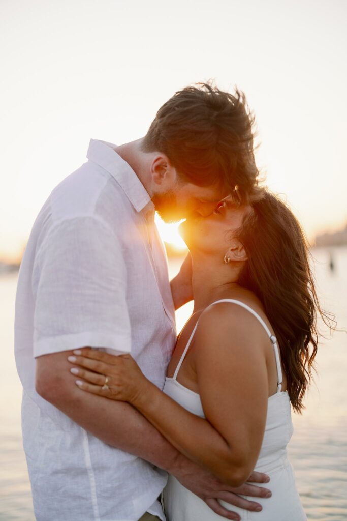 bride and groom posing for north avenue beach engagement photos