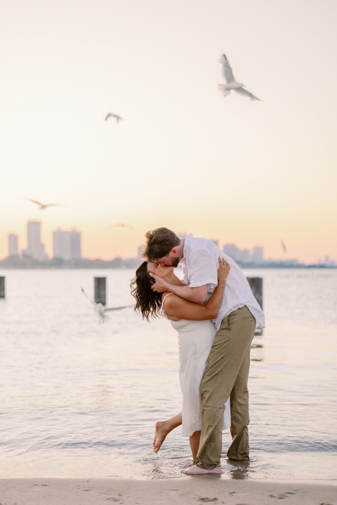 bride and groom posing for north avenue beach engagement photos