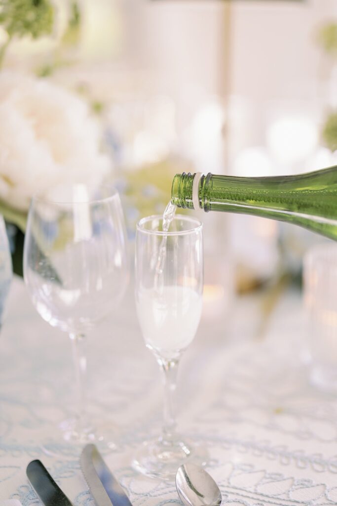 champagne being poured for stonebridge country club wedding