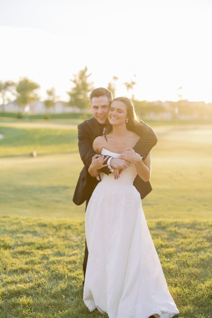 bride and groom smiling together at stonebridge country club wedding