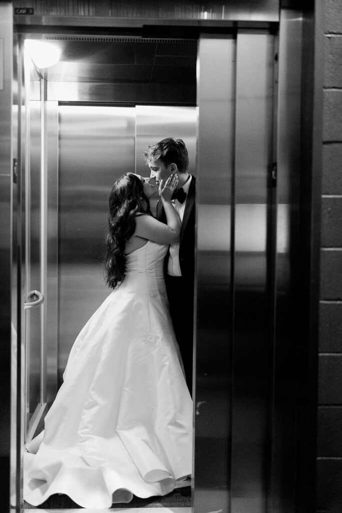 bride and groom in elevator at the dalcy wedding