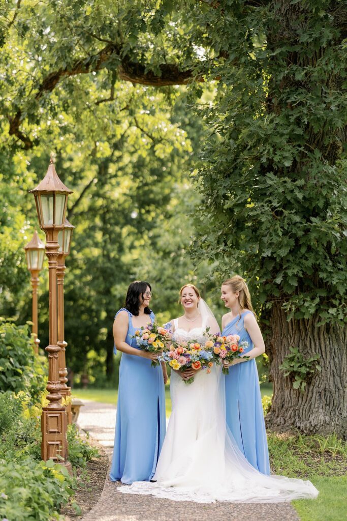 bridesmaids posing at the grove redfield estate wedding