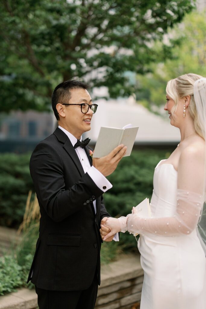 couple reads private vows before Garfield Park Conservatory Wedding