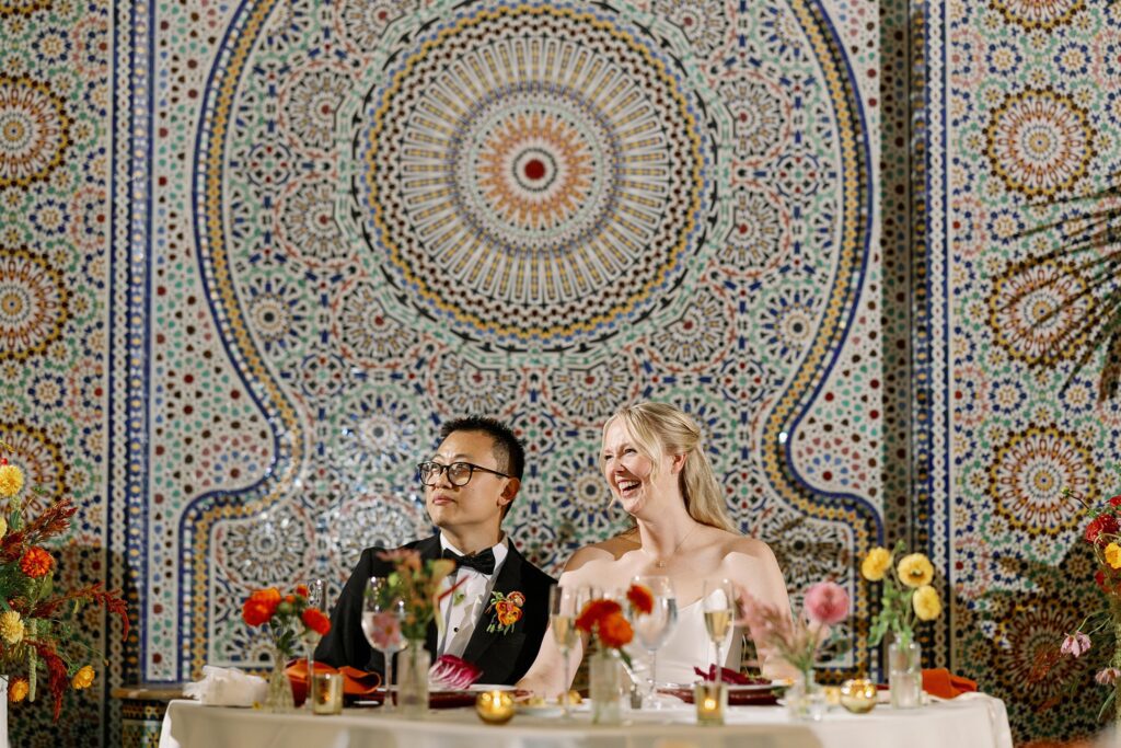 bride and groom hearing toasts at Garfield Park Conservatory Wedding